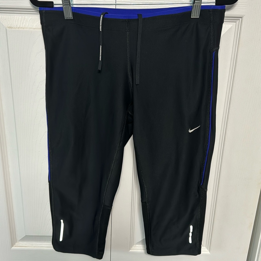 Nike women’s capri M leggings 2 pair as pictured black/royal blue and all black